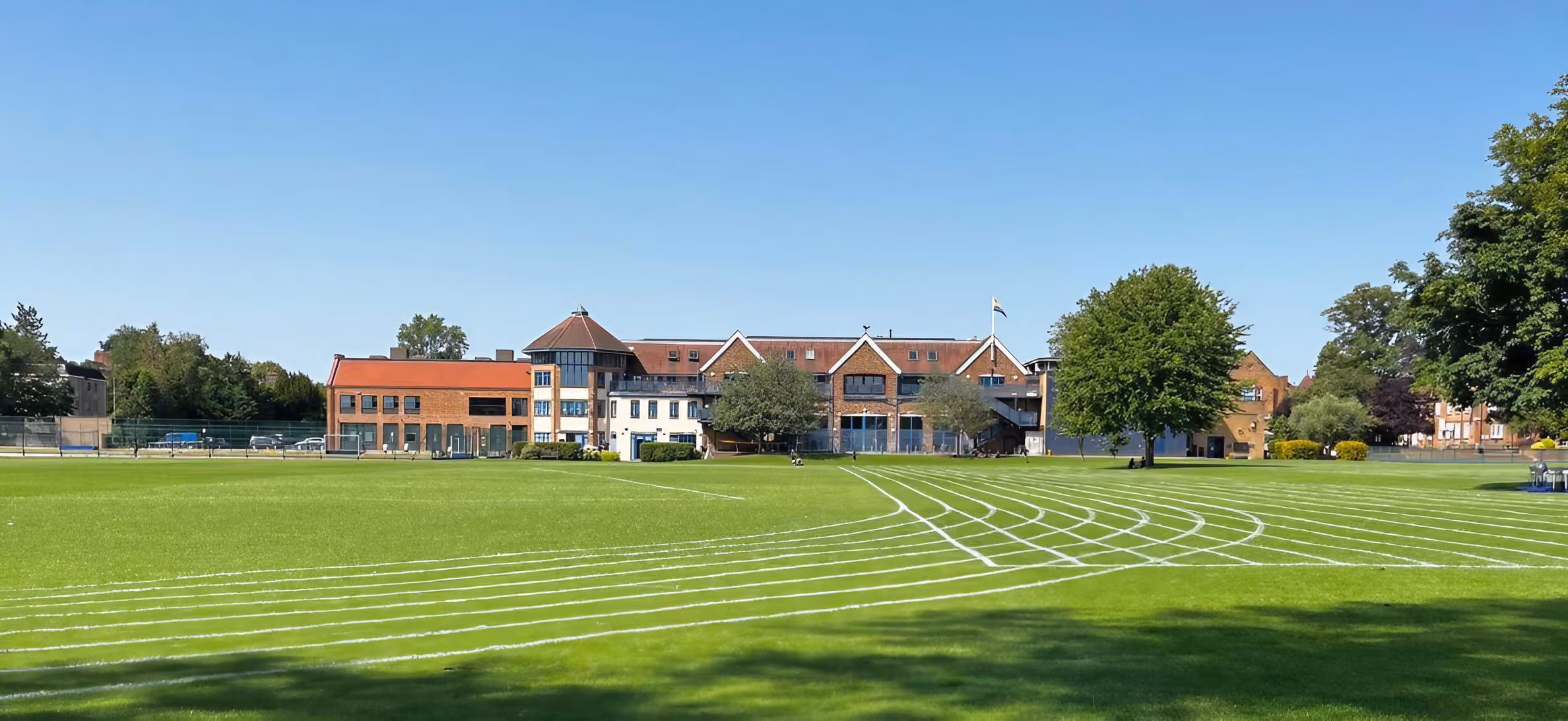 The Dragon School, Oxford: playing fields with school buildings beyond